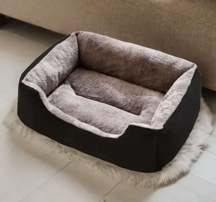 Cozy all-in-one cat and dog bed with cushioned interior, perfect for pets to relax and stay warm at home.